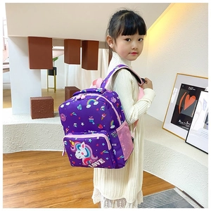 Detailed view of kids purple unicorn backpack with rainbow and stars print