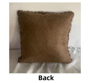 Detail view of the brown plush pillowcase back showing suede texture and faux fur edges