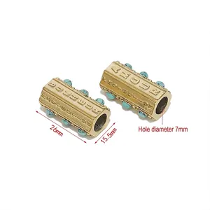 Detail showing gold stainless steel hexagonal bead dimensions with 26mm length and 7mm hole