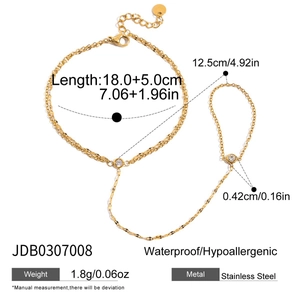 Detail of 18k gold plated slave bracelet with zircon stones and waterproof stainless steel