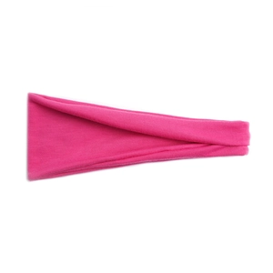 Détail du bandeau de yoga élastique rose rouge montrant le tissu en coton doux et sa texture