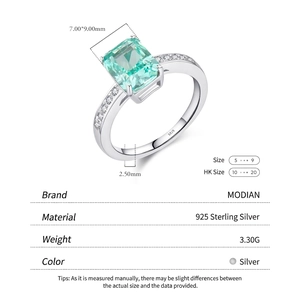 925 sterling silver ring featuring a 7x9mm emerald-cut paraiba blue gemstone for women