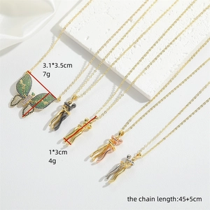Zircon butterfly pendant and hug necklace set on elegant white fabric background