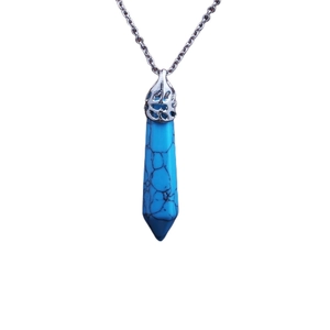 Detail of blue hexagonal crystal pillar pendant on a silver-tone chain necklace