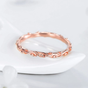 Vintage floral engraved S925 sterling silver ring in rose gold finish on white tray
