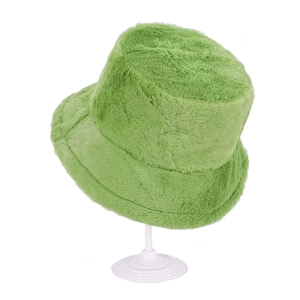 Solid grass green plush bucket hat for winter displayed on a clean white stand