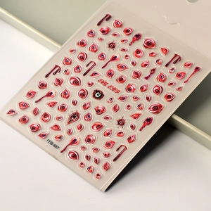 Macro shot of 5D embossed blood drips and evil eye nail art stickers FEB-887 details