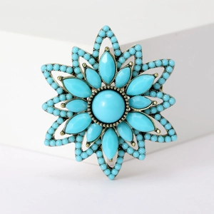 Vintage Turkish brooch with turquoise stones and bohemian brass flower design details