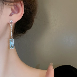 French luxury silver needle earrings with blue geometric glass stone and cubic zirconia