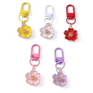 Floral keychain set with colorful enamel flower pendants in yellow white red pink and purple