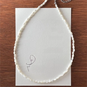 Minimalist 925 sterling silver beaded necklace with white rice shell beads and silver clasp
