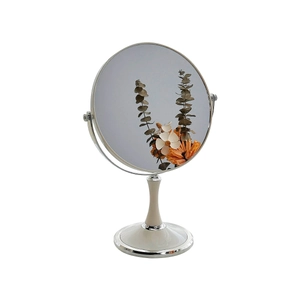Minimalist round desktop makeup mirror with creamy frame and sturdy silver metal base