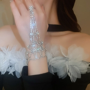 Close-up of sparkling silver ring bracelet with multiple layers of inlaid crystals