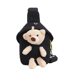 Kids black canvas crossbody bag with cute 3D khaki plush bear ornament on white background