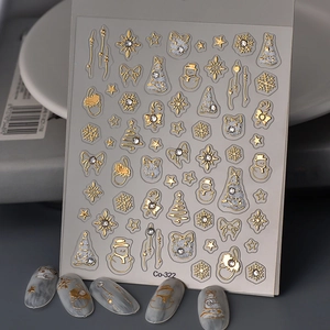 3D Christmas nail stickers with gold stamping, snowman designs, and rhinestones