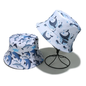 White bucket hat set with ocean dolphin and whale prints for summer beach vacations