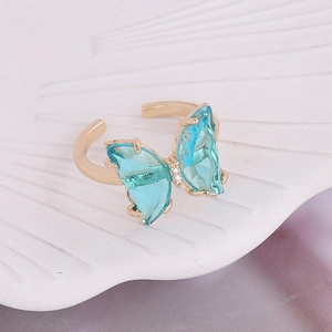 Fashionable gold ring featuring a 3D blue butterfly crystal with sparkling zircon accents