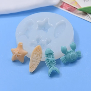 DIY ocean themed silicone mold for cakes with starfish crab and surfboard shapes