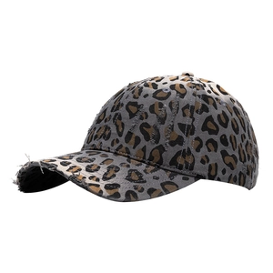 Distressed vintage leopard print baseball cap with frayed details and worn finish