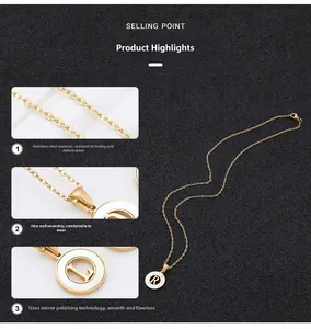 Detail of mirror-polished gold stainless steel initial letter pendant necklace