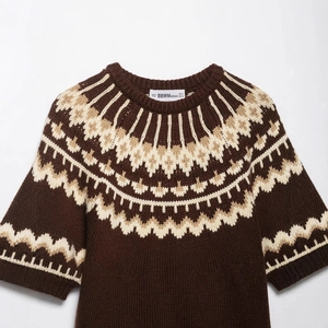 Deep brown Fair Isle knit cardigan with white vintage patterns and classic crew neck