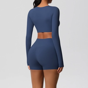 Detail of navy blue brushed athletic set showing seamless back fit and high-stretch fabric