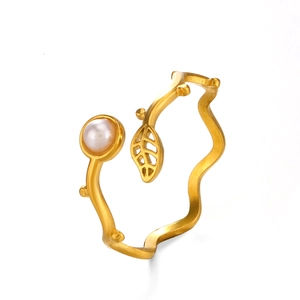 Vintage golden leaf ring with pearl accent and adjustable minimalist band for women