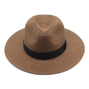 Classic dark brown unisex straw Panama hat with black ribbon and breathable weave design