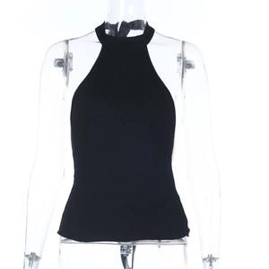 Detail of slim fit black halter neck knit vest showing smooth fabric texture on mannequin