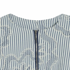 Women's blue striped jacket with metal zipper and white floral embroidery detail