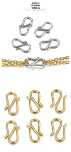Macro view of gold and silver S-hook clasps for DIY jewelry making and chain linking