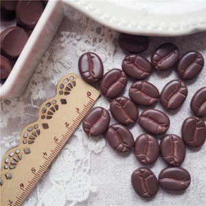 Deep brown resin coffee bean models with ruler showing 1.5cm size for DIY crafts