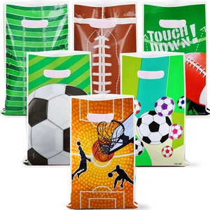 Close-up of plastic party gift bags with assorted sports themes like soccer and basketball