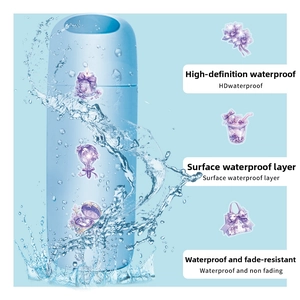 Waterproof purple floral stickers on a water bottle showing durable PET material