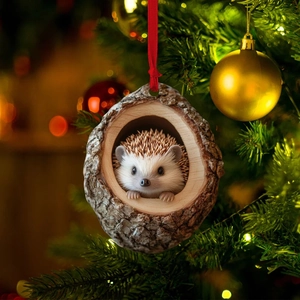 Detail of Christmas tree ornament featuring a cute hedgehog peeking from a tree hole