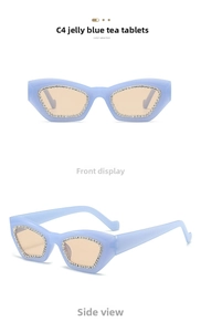 Close-up of C4 vintage Y2K sunglasses with jelly blue resin frame and crystal rhinestones
