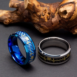 Polished 8mm stainless steel rings with heartbeat pattern and carbon fiber inlay