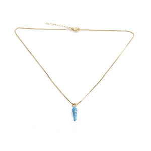 Detail shot of a blue chili pendant on a gold chain with lobster clasp and extender