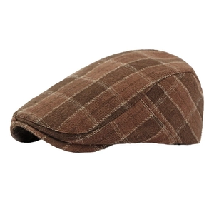 Vintage brown plaid newsboy cap for men and women in classic flat cap style on white back