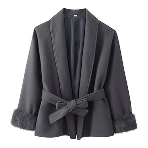 Dark grey wool coat with faux fur cuffs and waist tie belt on white background