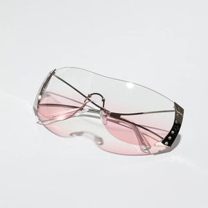 Y2K rimless shield sunglasses with pink gradient lenses and sparkling rhinestone metal frame