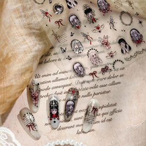 Gothic dark girl aesthetic nail decals with rabbits and rubies for Halloween manicure