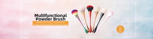 Detail of six colorful mushroom nail dust brushes with metallic handles and soft bristles