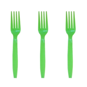 Close-up of three vibrant green plastic party forks for kids birthday celebration