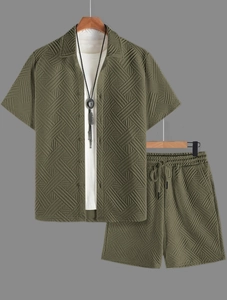 Detailed view of the textured jacquard knit fabric on the men's summer shirt and shorts set