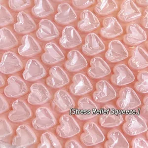 Pink heart-shaped bubble wrap sheets for protective gift packaging and shockproof mailing
