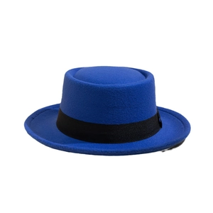 British style bright blue wool pork pie hat with black ribbon band and flat brim