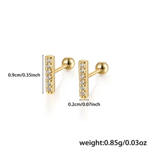 Detailed close-up of golden 925 silver stud earrings with zircons and screw ball backs