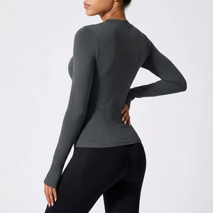 Haut de compression gris foncé à manches longues avec détails en mesh pour femme