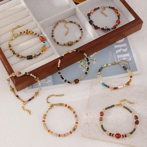 Handmade colorful gemstone beaded bracelet with gold adjustable chain in warm vintage style